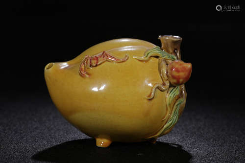 YELLOW GLAZED AND CARVED 'PEACH' WATER DRIP