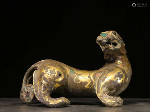 GILT BRONZE CAST AND DECORATED 'MYTHICAL BEAST' PROWLING FIGURE