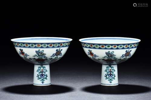 PAIR OF DOUCAI 'EIGHT TREASURES' STEM CUPS