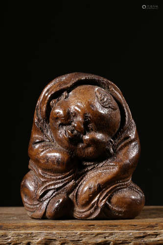 BAMBOO CARVED 'MILEFO' SMALL FIGURE