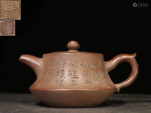 YIXING ZISHA INSCRIBED AND COMPRESSED TEAPOT