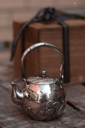 JAPANESE SHOWA PERIOD SILVER TEAPOT WITH LIFTING HANDLE