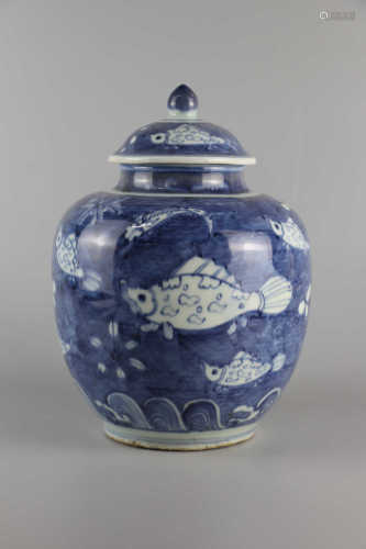 Blue and white fish and algae decorated jar