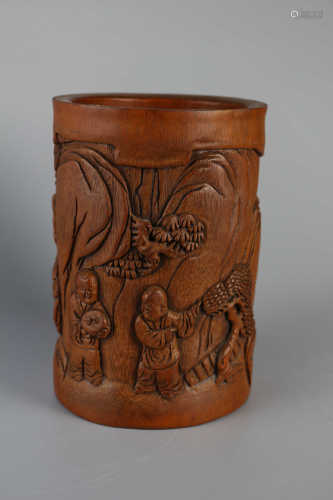 Bamboo pen holder with carved figures and flowers