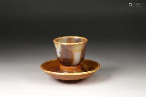 A CHINESE AGATE TEA CUP WITH PLATE