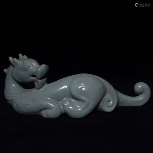 A CHINESE RU YAO PAPERWEIGHT WITH DRAGON PATTERN