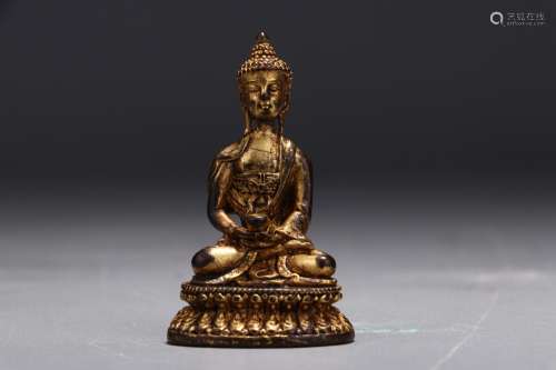 A CHINESE GILT BRONZE GAUTAMA BUDDHA