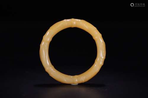 A CHINESE HETIAN JADE BANGLE WITH BAMBOO PATTERN