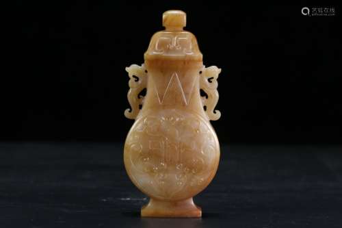 A CHINESE HETIAN JADE EAR VASE WITH DRAGON CARVING