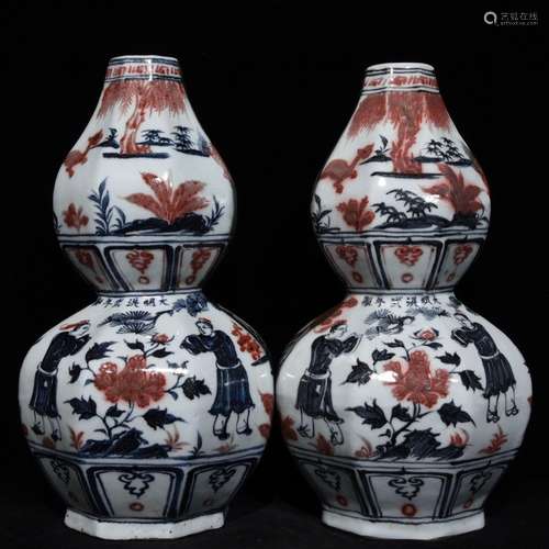 A CHINESE BLUE AND WHITE UNDERGLAZE RED GOURD VASE