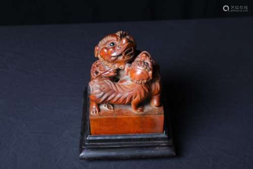 A CHINESE BOXWOOD SEAL WITH BEAST CARVING