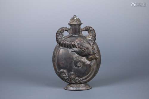 A CHINESE SILVER JAR WITH BEAST PATTERN