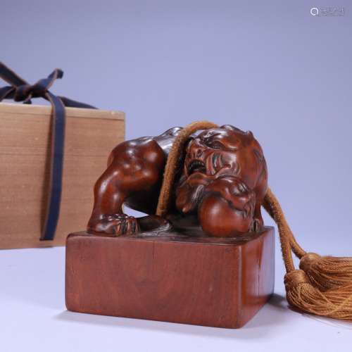A CHINESE ZITAN WOOD SEAL WITH BEAST CARVING