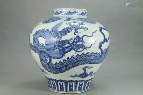 A CHINESE BLUE AND WHITE JAR WITH DRAGON PATTERN