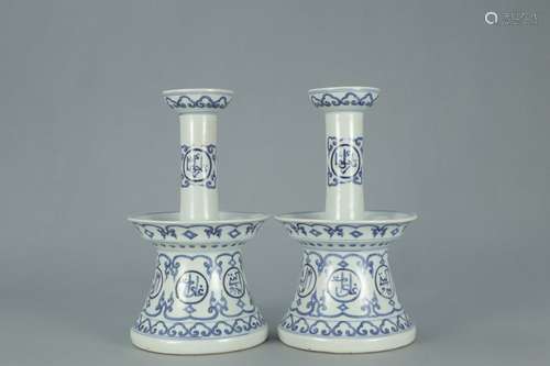 PAIR OF CHINESE BLUE AND WHITE CANDLESTICKS