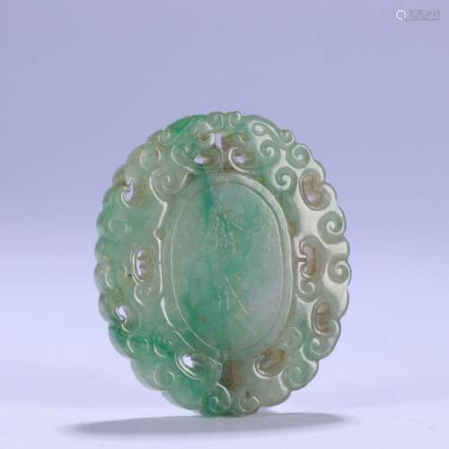A CHINESE JADEITE PENDANT WITH DRAGON PATTERN