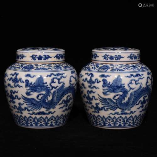 PAIR OF CHINESE BLUE AND WHITE JARS WITH DRAGON PATTERN