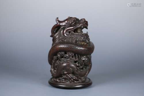 A CHINESE ROSEWOOD INCENSE HOLDER WITH DRAGON CARVING