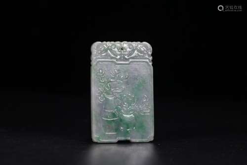 A CHINESE JADEITE PENDANT WITH FLOWER CARVING