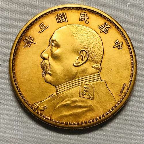 A CHINESE GOLD COIN