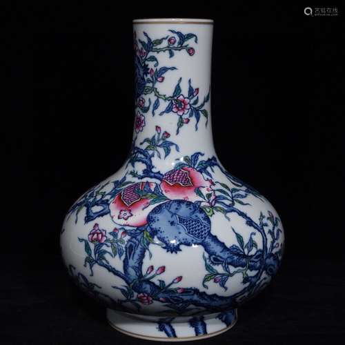 A CHINESE BLUE AND WHITE BOTTLE VASE WITH POMEGRANATE PATTERN