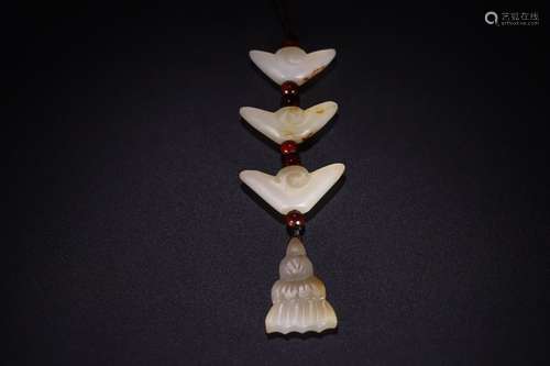 A CHINESE HETIAN JADE PENDANT WITH INGOT SHAPE