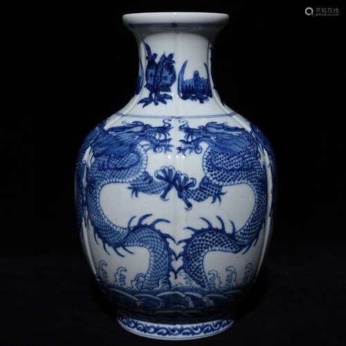 A CHINESE BLUE AND WHITE VASE WITH DRAGON PATTERN