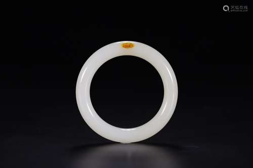 A CHINESE HETIAN JADE BANGLE