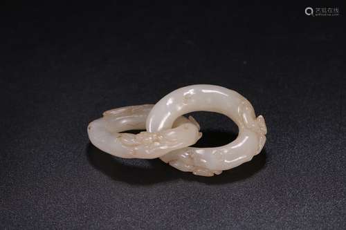 A CHINESE HETIAN JADE HANDPIECE