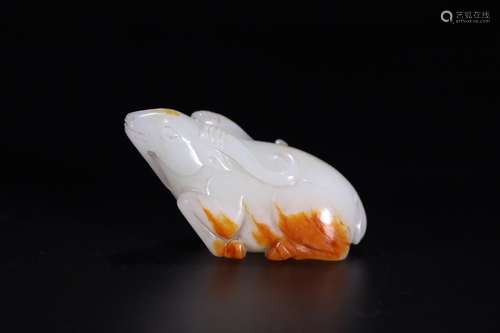 A CHINESE HETIAN JADE BEAST ORNAMENT