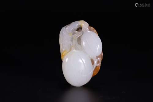 A CHINESE HETIAN JADE HANDPIECE WITH FRUIT SHAPE