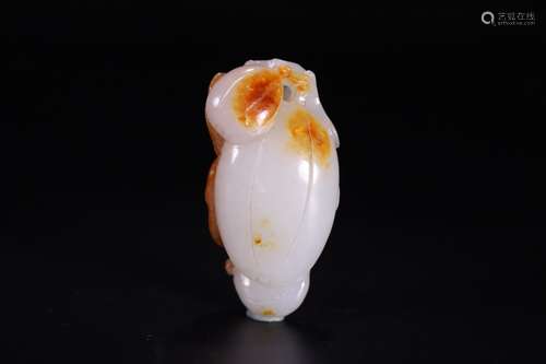 A CHINESE HETIAN JADE HANDPIECE WITH FRUIT SHAPE