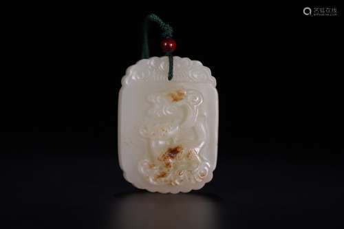 A CHINESE HETIAN JADE PENDANT WITH AUSPICIOUS PATTERN
