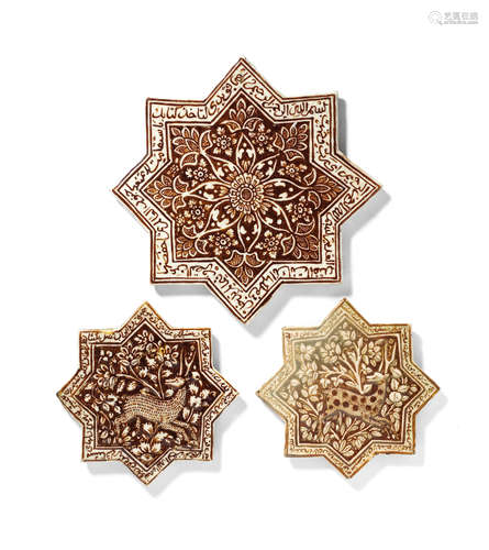 Three Qajar 'Kashan style' lustre pottery star tiles Persia, 19th Century (3)