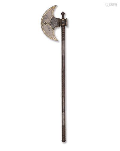 A Qajar gold-damascened steel axe (tabar) Persia, 19th Century