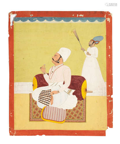 A prince seated against a terrace smoking a hookah, an attendant with a flywhisk standing nearby Jodhpur, or perhaps Nagaur, second half of the 18th Century