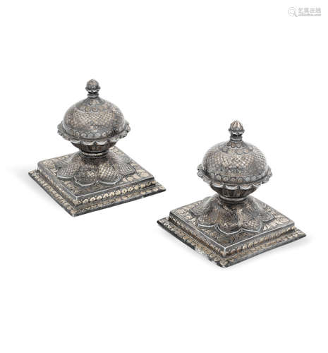 A pair of silver-inlaid alloy bidri carpet weights Deccan, 19th Century (2)