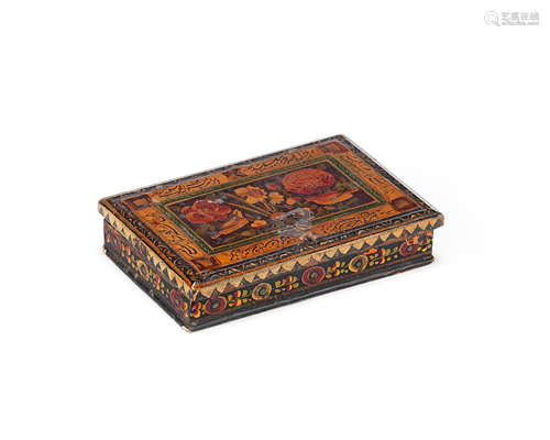 A Qajar lacquer box containing a set of portable merchant's weights and scales Persia, 19th Century