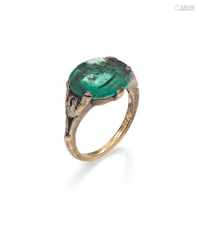 An Ottoman engraved calligraphic emerald ring possibly Egypt, 17th/ 18th Century