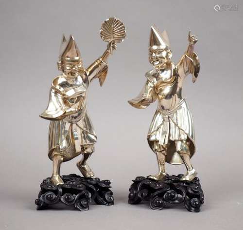 Paire de statuettes en argent, représentant des am…