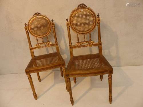 Pair of Louis XVI style chairs in gilded and carve…