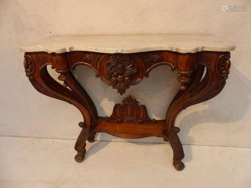 A Napoleon III console in mahogany surmounted by a…