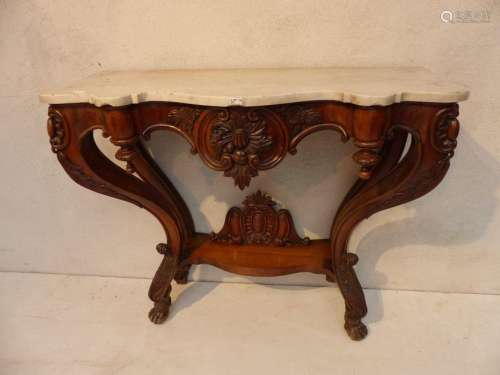 A Napoleon III console in mahogany surmounted by a…
