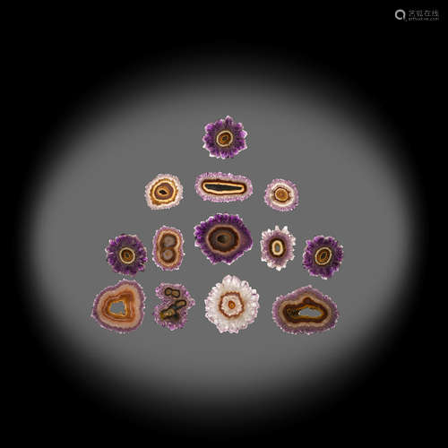 Thirteen Amethyst Stalactite Cross-Section Slices