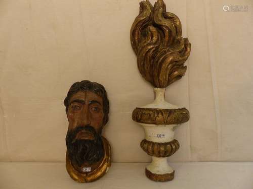 A carved wooden bearded man's head and a wooden sc…