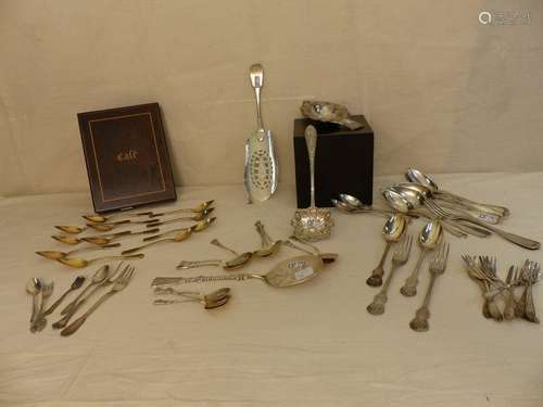 A rosewood box with 11 spoons and a set of silver …