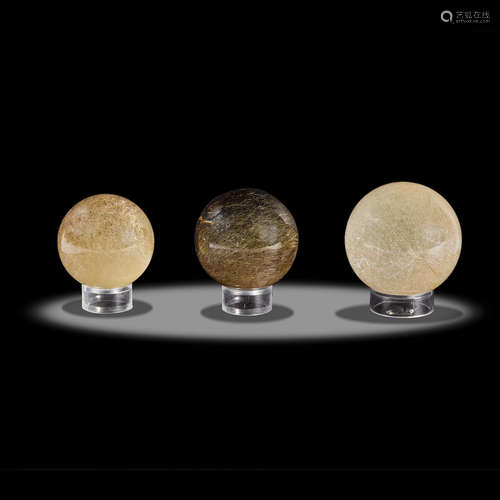 Three Rutilated Smoky Quartz Spheres