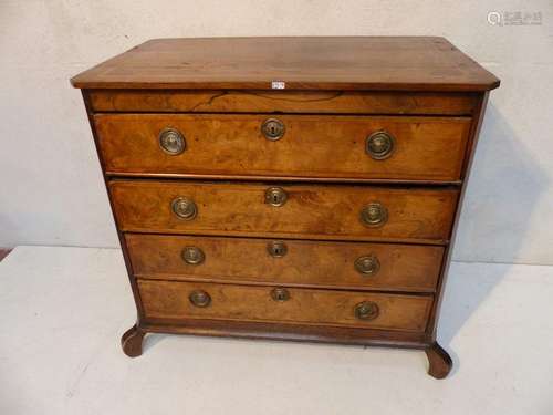 A Dutch veneer chest of drawers. Circa 1800.