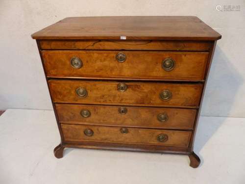 A Dutch veneer chest of drawers. Circa 1800.