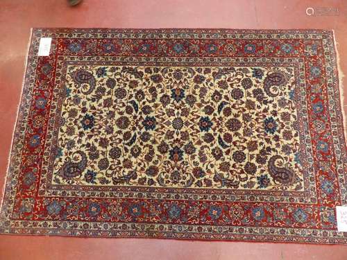 A woollen rug with a floral design, like Tabriz. I…